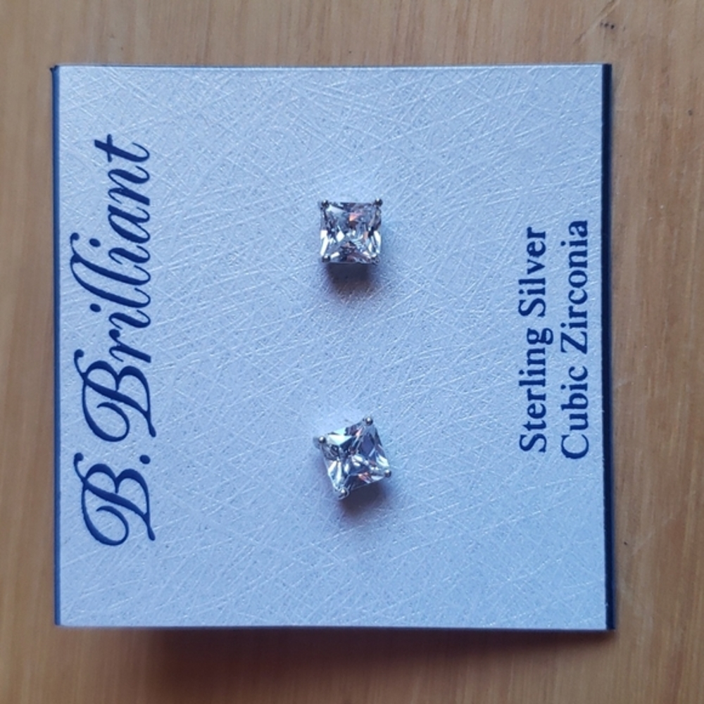 B. Brilliant Sterling Silver Solitaire Earrings.